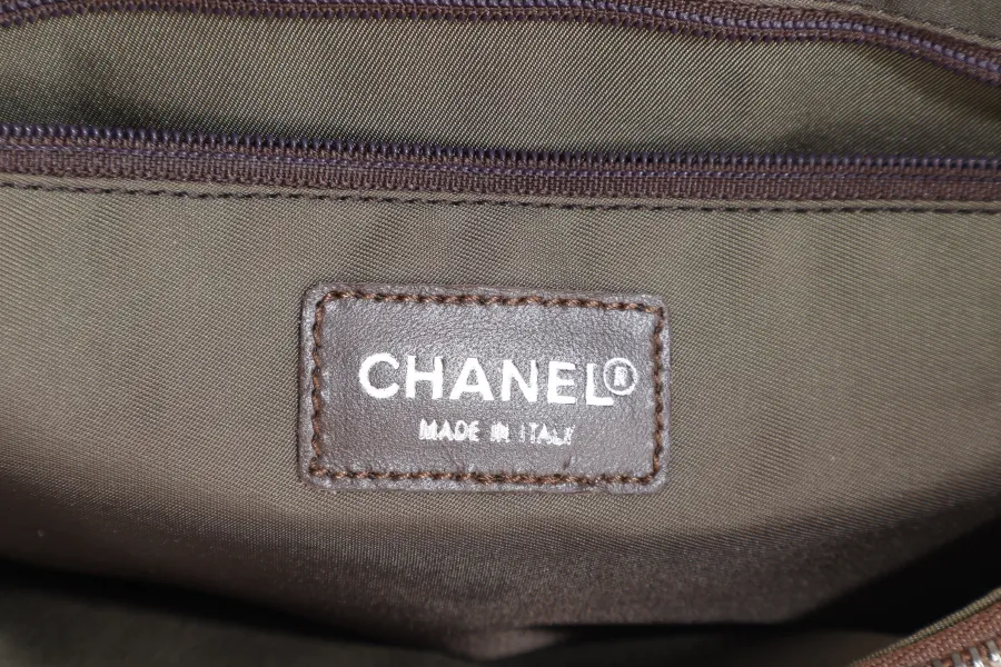 CHANEL SPORTS LINE BACKPACK (705xxxx) GREEN CANVAS SILVER HARDWARE WITH  AND DUST COVER