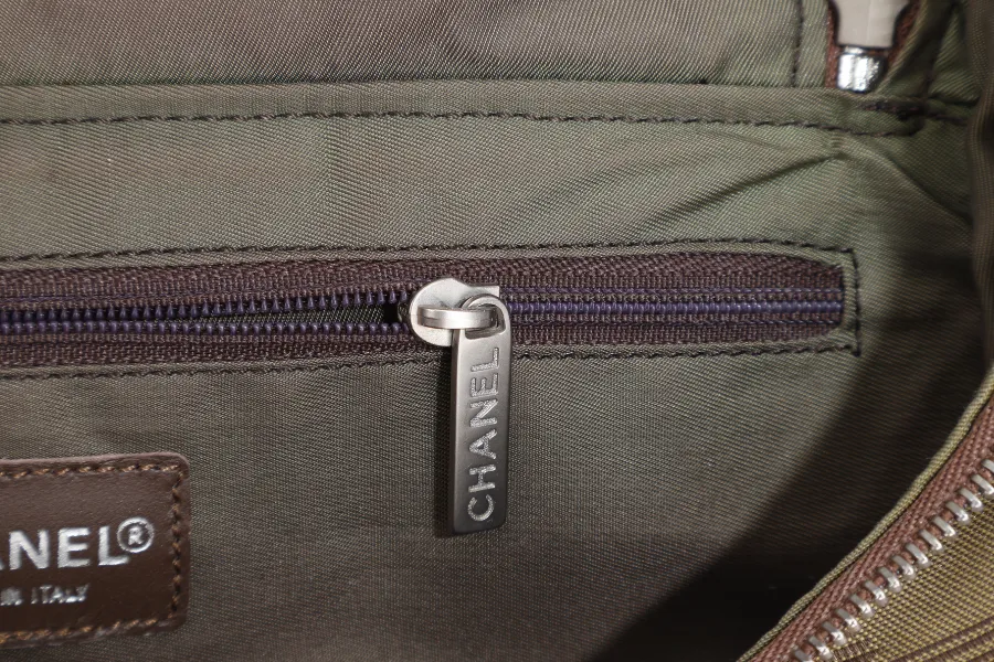 CHANEL SPORTS LINE BACKPACK (705xxxx) GREEN CANVAS SILVER HARDWARE WITH  AND DUST COVER